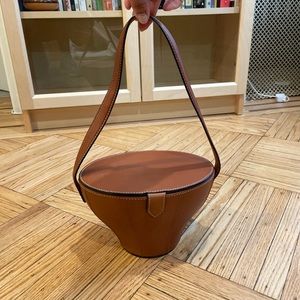 Staud brown sculptural saddle bag in leather